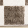 Leopold Checkered Brown White Geometric Area Rug - 5'3" x 7'7"|Carpette géométrique Leopold brune et blanche à motif de carreaux - 5 pi 3 po x 7 pi 7 po