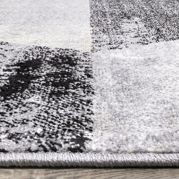 Carpette Covington à motifs de triangles vieillis - 2 pi 8 po x 7 pi 7 po