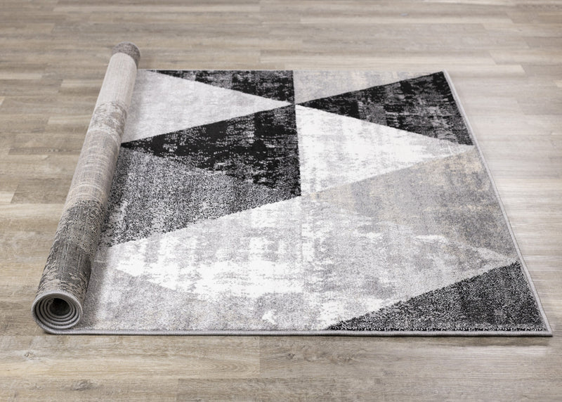 Carpette Covington à motifs de triangles vieillis - 2 pi 8 po x 7 pi 7 po