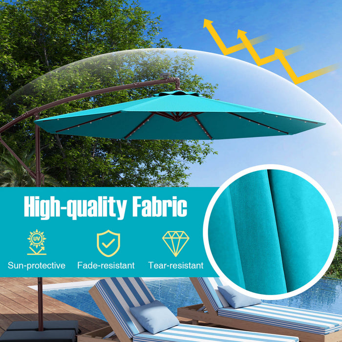 Parasol deporte suspendu Costway 10 pieds avec 32 LED, sac de sable, base croisee exterieure turquoise