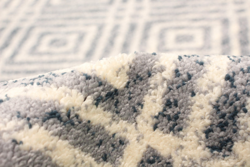 Carpette Electra argent-couleur pétrole - 7 pi 10 pox 10 pi 2 po